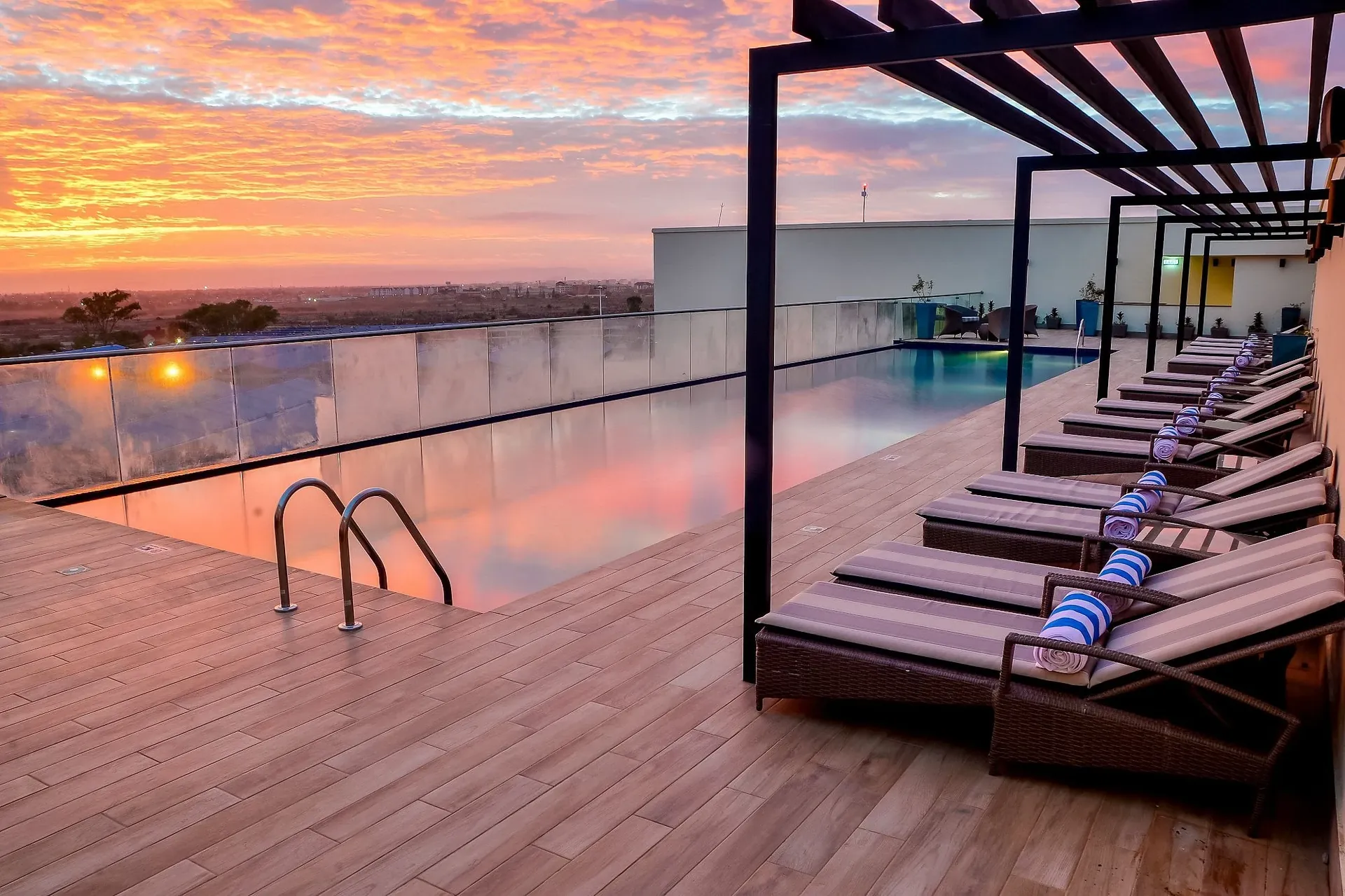 Hilton Garden Inn Nairobi — rooftop pool at sunrise
