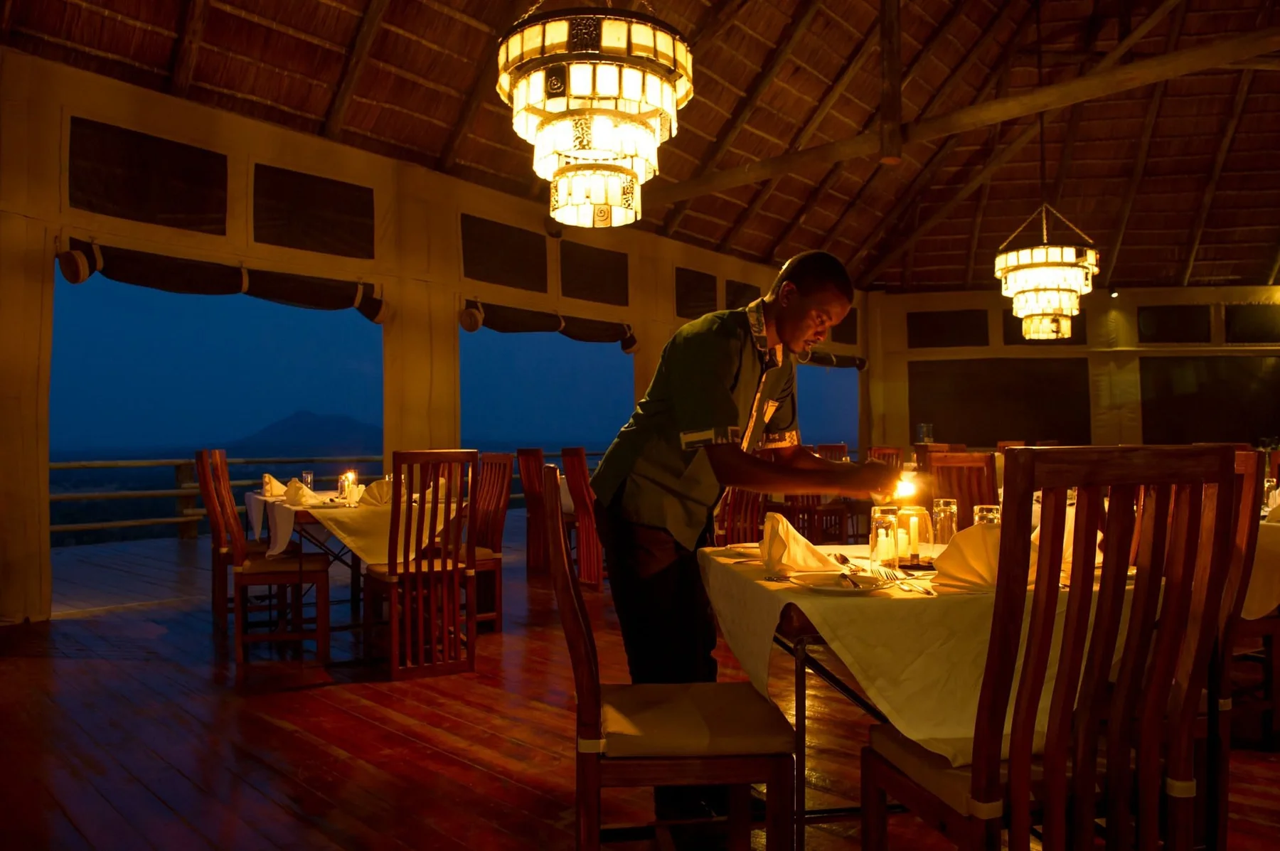 Kubu Kubu Tented Lodge — dining deck by lantern light