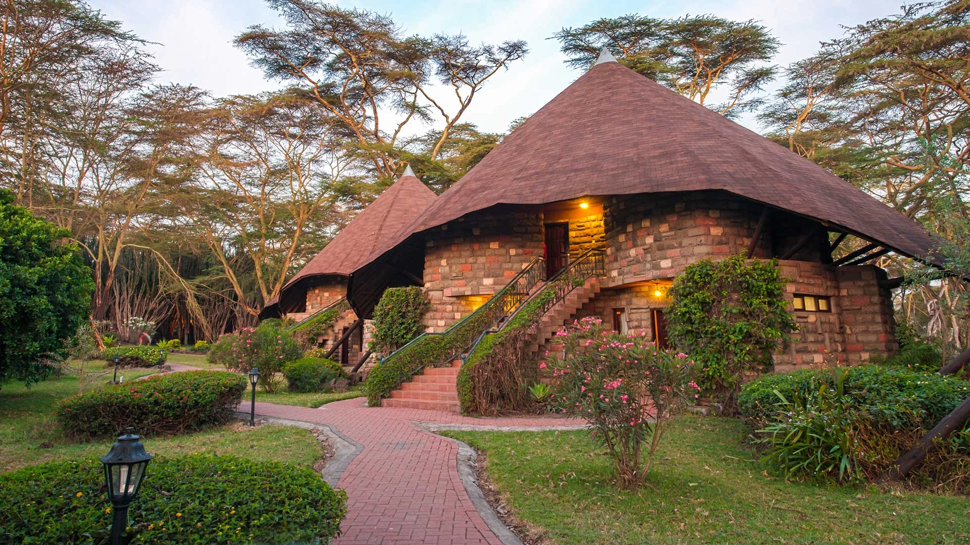 Lake Naivasha Sopa Lodge — cottages at dusk