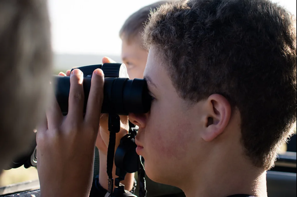 Game viewing with binoculars, Ol Pejeta Conservancy