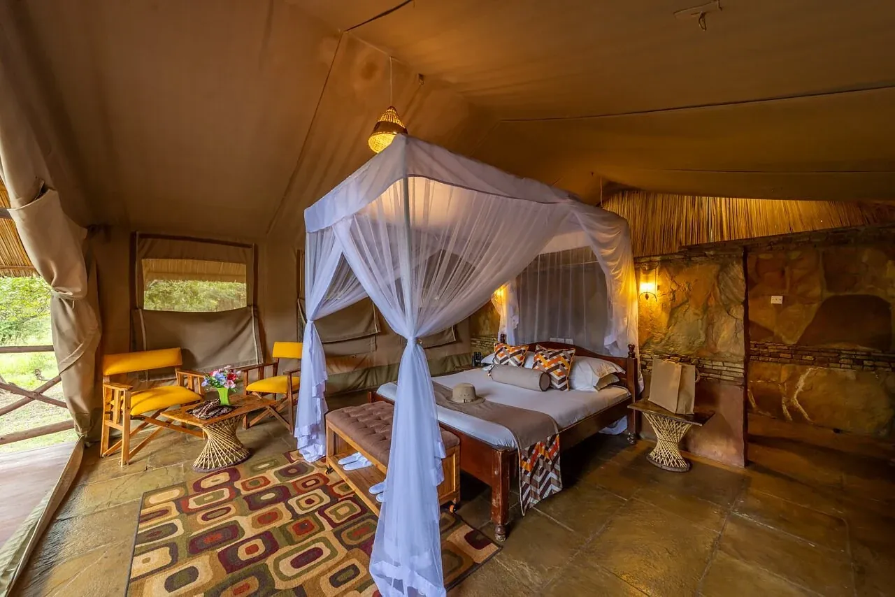 Sentrim Mara Camp — lobby lounge with safari murals