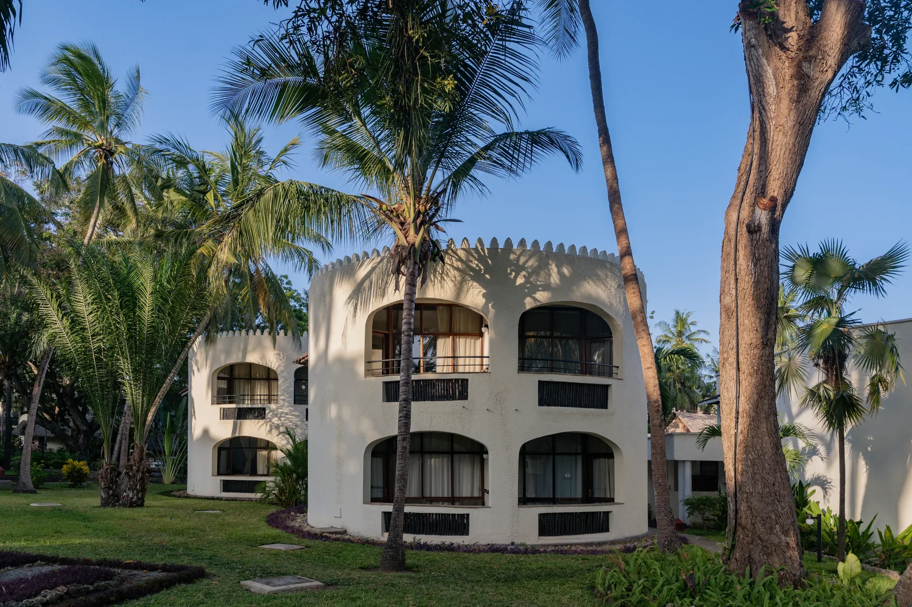 Severin Sea Lodge — tower room exteriors among the palms