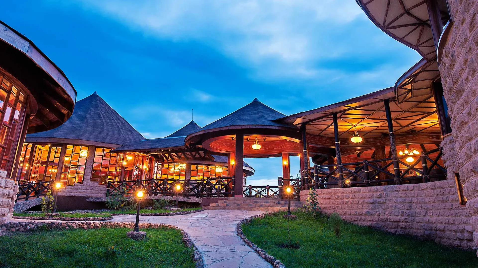 Lake Nakuru Sopa Lodge — lit up at dusk