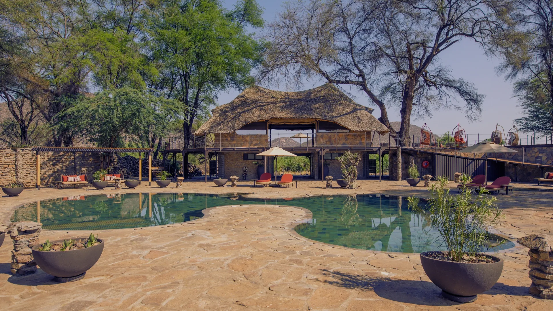 Pool and thatched lounge, Soroi Samburu Lodge